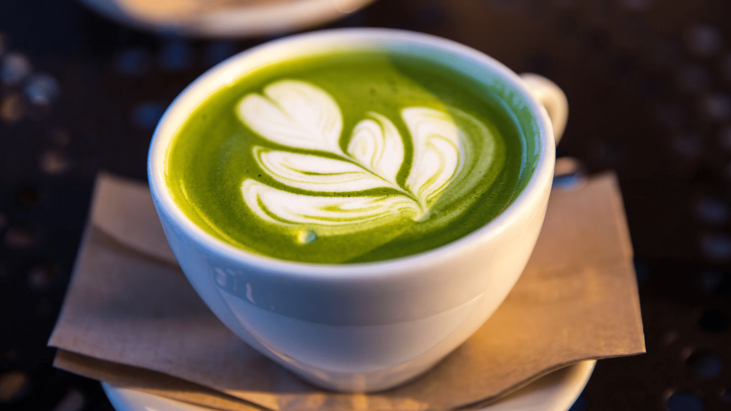 Close up cup of matcha latte